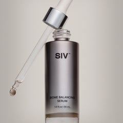 SIV Biome Balancing Serum bottle with dropper on a neutral background