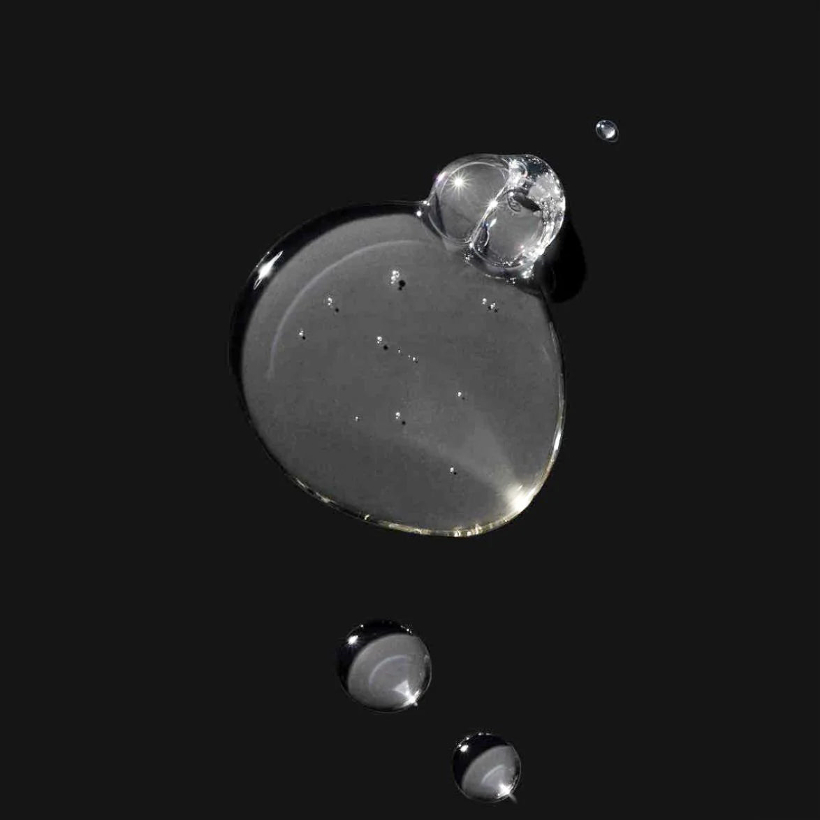 Close-up of water droplets on a black background