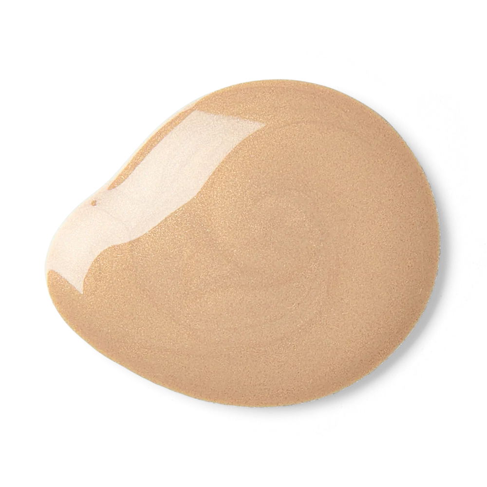 Beige makeup sponge on a white background