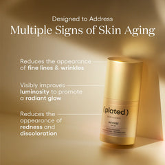 Gold skincare serum bottle with text on a beige background
